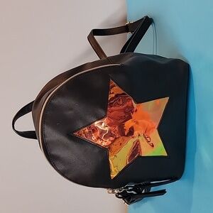 T- Shirt And Jeans Holographic Star Mini Backpack in Black
